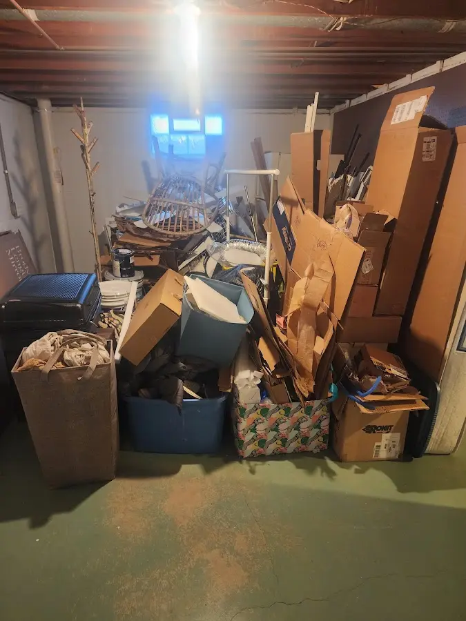 Roll-off dumpster container at job site for 8 Yard Dumpster Rental in Titusville